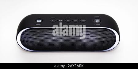 Black Bluetooth speaker with lights on isolated in white background Stock Photo