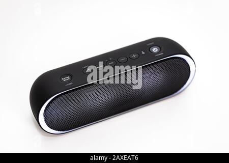 Black Bluetooth speaker with lights on isolated in white background Stock Photo