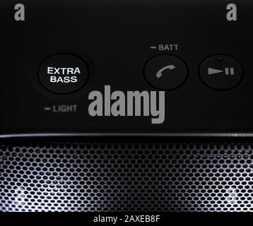 Black Bluetooth speaker with lights on isolated in white background Stock Photo