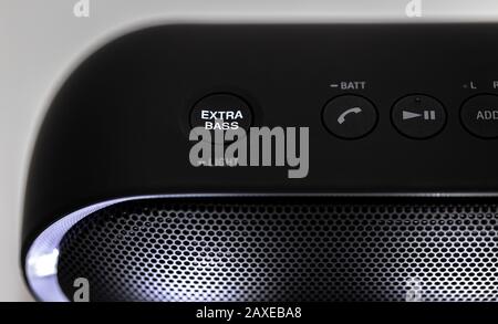 Black Bluetooth speaker with lights on isolated in white background Stock Photo