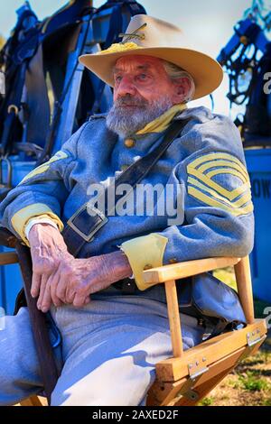 Re-enactor wearing the uniform of a Sergeant in the Confederate Army at an event in Tucson AZ Stock Photo