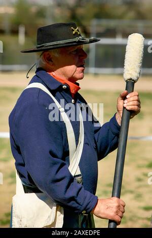 Renactor dressed in a uniform of the 1880s US Army artillery man in the 5th Cavalry at Fort Lowell, Tucson AZ Stock Photo