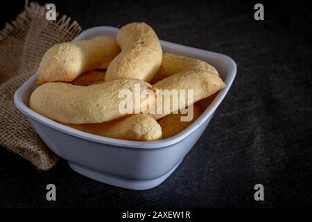 Brazilian homemade cheese bread, AKA 'chipa' in a bowl. Stock Photo