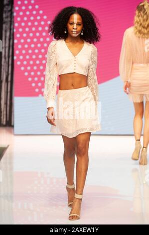 Model on the Brands Catwalk at Pure London AW20/21. 11th February 2020. Today marked the third of three successful days at the show held at Olympia in London, UK. Pure London caters for the fashion trade and features regular catwalks showcasing the forthcoming trends for the next season, seminars from industry experts, and all the latest lines from fashion and accessories brands the world over. Credit: Antony Nettle/Alamy Live News