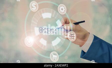 Conceptual hand writing showing Conduct. Concept meaning manner in which an organization or activity is managed or directed Stock Photo