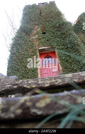 Entrance to the Rehoboth Rock Church/ Rehoboth Mennonite Church in Schuyler, VA, USA. Exterior walls covered in English Ivy. Stock Photo