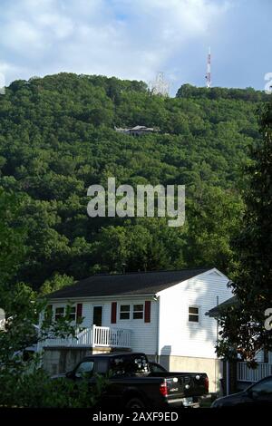 The Mill Mountain Star visible from a neighborhood in Roanoke, VA, USA Stock Photo