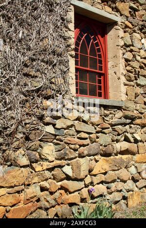 Rehoboth Rock Church/ Rehoboth Mennonite Church in Schuyler, VA, USA. Exterior stone wall with small window. Stock Photo