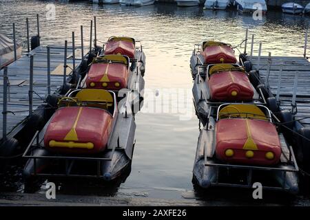 Pedal boats on Lake Como, Lombardy Italy, a beautiful alpine lake of picturesque villages, luxurious villas, palazzo, holiday resorts dramatic scenery Stock Photo