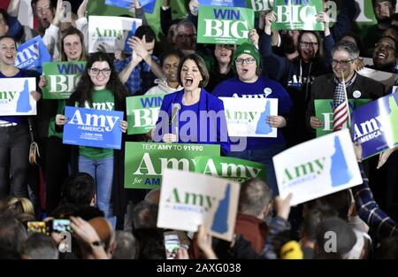 Concord, United States. 11th Feb, 2020. Democratic presidential candidate for 2020 and Minnesota Sen. Amy Klobuchar greets the crowd during a New Hampshire 2020 presidential primary night event at the Grappone Center in Concord, New Hampshire on Tuesday, February 11, 2020. Klobuchar appeared to be on the way to a third place finish in the first in the nation presidential primary. Photo by Joshua Reynolds/UPI Credit: UPI/Alamy Live News