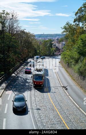 Road traffic with cars and tram at Chotek Park (Chotkovy sady) in Prague Stock Photo