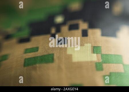 Military camouflage blanket design close up macro Stock Photo