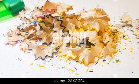 red, blue and green pencil shaving on white background Stock Photo
