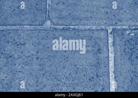 Paving slabs close-up, top view. Abstract background blue color toned Stock Photo