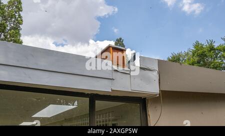 Beehives in city rooftops - a beehive on a residential rooftop image in horizontal format Stock Photo