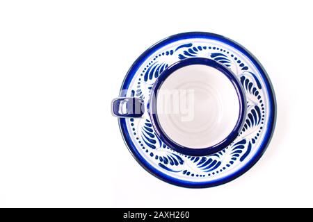 Mexican pottery, named talavera poblana on a flat lay view. white background with empty space for text Stock Photo