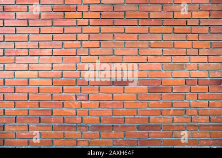 Old grunge brick wall background. Brick house. Brickwork Stock Photo
