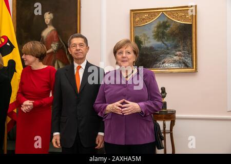 Bundeskanzlerin Angelka Merkel mit Ehemann Joachim Sauer beim Defilee, Abendessen zu Ehren von Joachim Gauck 80. Geburtstag im Schloss Bellevue, Berli Stock Photo