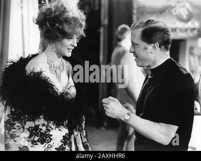 MAGGIE SMITH and Director RICHARD ATTENBOROUGH on set candid filming Music Hall sequence for OH ! WHAT A LOVELY WAR 1969 based on Joan Littlewood's Theatre Workshop Production Accord Productions / Paramount British Pictures Stock Photo