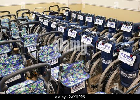 KAGAWA, JAPAN - FEBRUARY 01, 2020: Many wheelchairs in the hospital, wheelchairs to be served for outpatient. Kagawa Mitoyo Hospital. Stock Photo