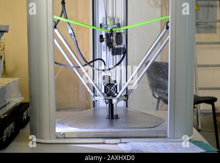 The process of working 3D printer and creating a three-dimensional object. Progressive modern additive technology. 4ht industrial revolution. Stock Photo