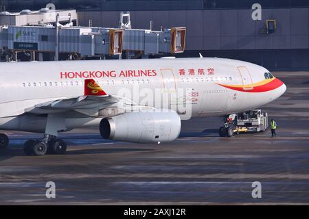 TOKYO, JAPAN - DECEMBER 5, 2016: Hongkong Airlines Airbus A330 pushed back at Narita Airport of Tokyo. The airport is the 2nd busiest airport of Japan Stock Photo