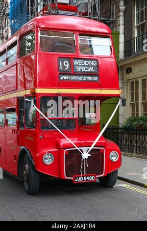 LONDON, UK - JULY 9, 2016: Historical Routemaster double decker bus hired for a wedding in London, UK. The bus was manufactured in 1954-68. Stock Photo