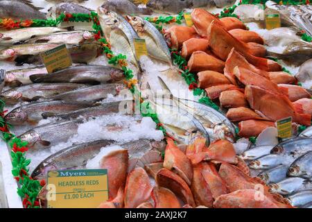 LEEDS, UK - JULY 12, 2016: Sea food stall at Leeds Kirkgate Market in the UK. There are 800 stalls in the market. It is visited by 100,000 weekly shop Stock Photo