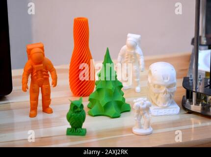 Bright colorful objects printed by a 3d printer close-up. Progressive modern additive technology. Copy spase, spase for text. Stock Photo