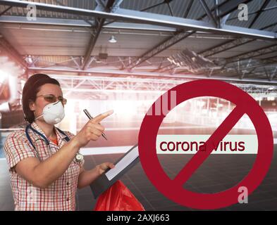 Alarmed female doctor wears medical mask China. Coronavirus infection 2019-nCoV. 2019-nCoV. People wear mask at airport to prevent infection from coro Stock Photo