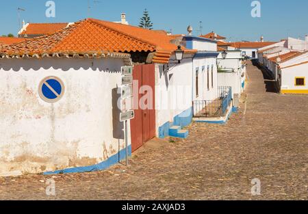 Small traditional rural settlement village with low rise one story houses and cobbled streets, Entradas, near Castro Verde, Baixo Alentejo, Portugal, Stock Photo