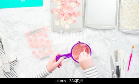 Step by step. Melting chocolate candy melts in an electric candy melting pot  Stock Photo - Alamy