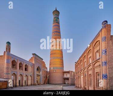 Islam Khodja or Islam Khoja Minaret and Madrassah, Itchan-Kala, Khiva, Uzbekistan, Central Asia Stock Photo