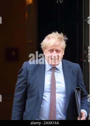 London, UK, 11th Feb 2020, Upbeat Prime Minister Boris Johnson leaving Downing Street after the weekly Cabinet Meeting. Stock Photo