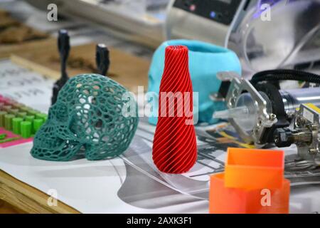 Bright colorful objects printed by a 3d printer close-up. Progressive modern additive technology. Copy spase, spase for text. Stock Photo
