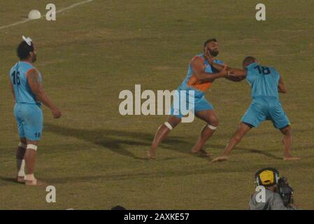 Kabaddi players seem in action during the match playing between India vs Sierra Leone, as Indian Kabaddi team win by 18-45 during Kabaddi World Cup 2020 at Punjab Stadium Lahore. Kabaddi World Cup 2020 begins in Pakistan. All is set for the 'Kabaddi World Cup 2020' being hosted in three cities Lahore, Faisalabad and Gujrat from February 09 to 16 February. respectively. The event is jointly organized by Punjab government, Sports Board Punjab (SBP) and Pakistan Kabaddi Federation (PKF). (Photo by Rana Sajid Hussain/Pacific Press)