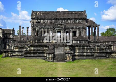 Ankor Wat, a 12th century historic Khmer temple and UNESCO world heritage site. Arches and carved stone temple structures. Archaeological site. Stock Photo