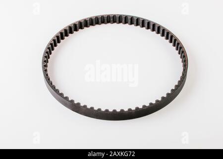 Spare parts Timing belt, pulley and tensioner for car. Isolate auto parts on white. Stock Photo