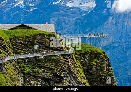 Mountain trail and platform First Cliff Walk presented by Tissot against the rock faces of the Bernese Alps, Grindelwald, Bernese Oberland, Switzerlan Stock Photo