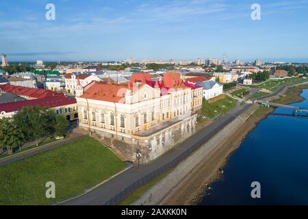 View of the old building of the Bread Exchange (1912) on the embankment of the Volga River on a July day (shooting from a quadrocopter). Rybinsk, Russ Stock Photo