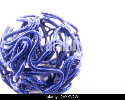 Closeup shot of a blue colored metal wire ball against a white background Stock Photo