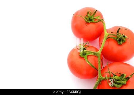 A bunch of tomatoes with a completely white background Stock Photo