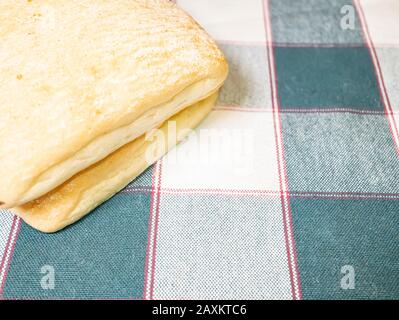 Baking buns with dough on the table. Food photo. Place for text. Background image. Stock Photo