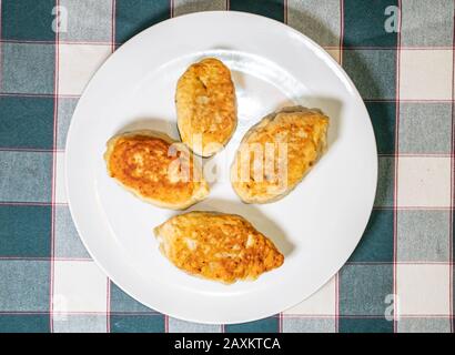 Dish cutlets on a white plate. Food photo. Place for text. Background image. Stock Photo