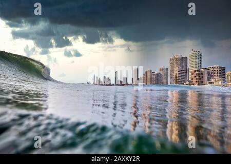 Gold Coast, Australia, A tsunami like king tide, thunderstorms and rain aproach the buildings of Surfers paradise Stock Photo