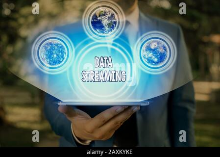 Conceptual hand writing showing Data Streaming. Concept meaning data that is continuously generated by different sources Elements of this image furnis Stock Photo
