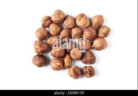 A handful of chopped hazelnuts isolated on white Stock Photo