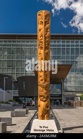 Carved Maori totem at Christchurch City Council building, Christchurch, South Island, New Zealand Stock Photo