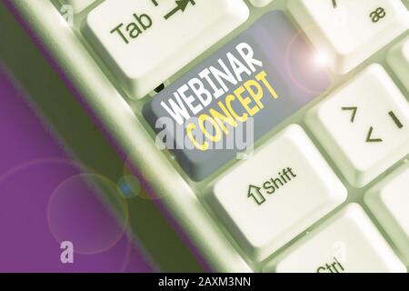 Conceptual hand writing showing Webinar Concept. Concept meaning workshop or seminar that is transmitted over the Web Stock Photo