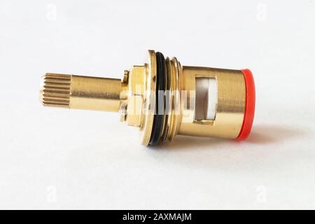 The Cassette of the faucet of the Water mixer.New detail insulated on light background Stock Photo